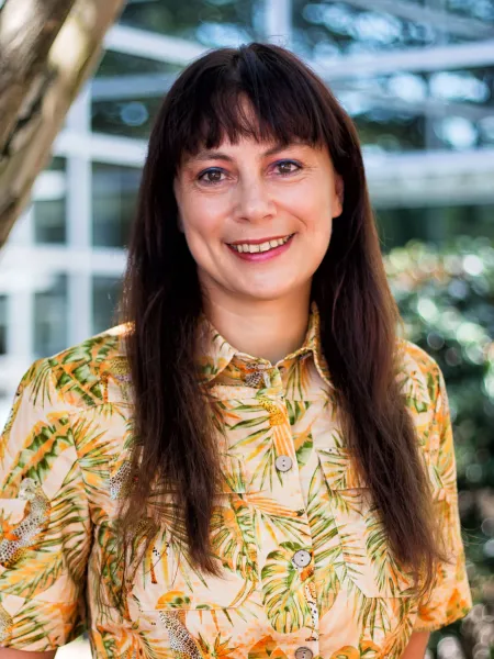 person wearing yellow smiling